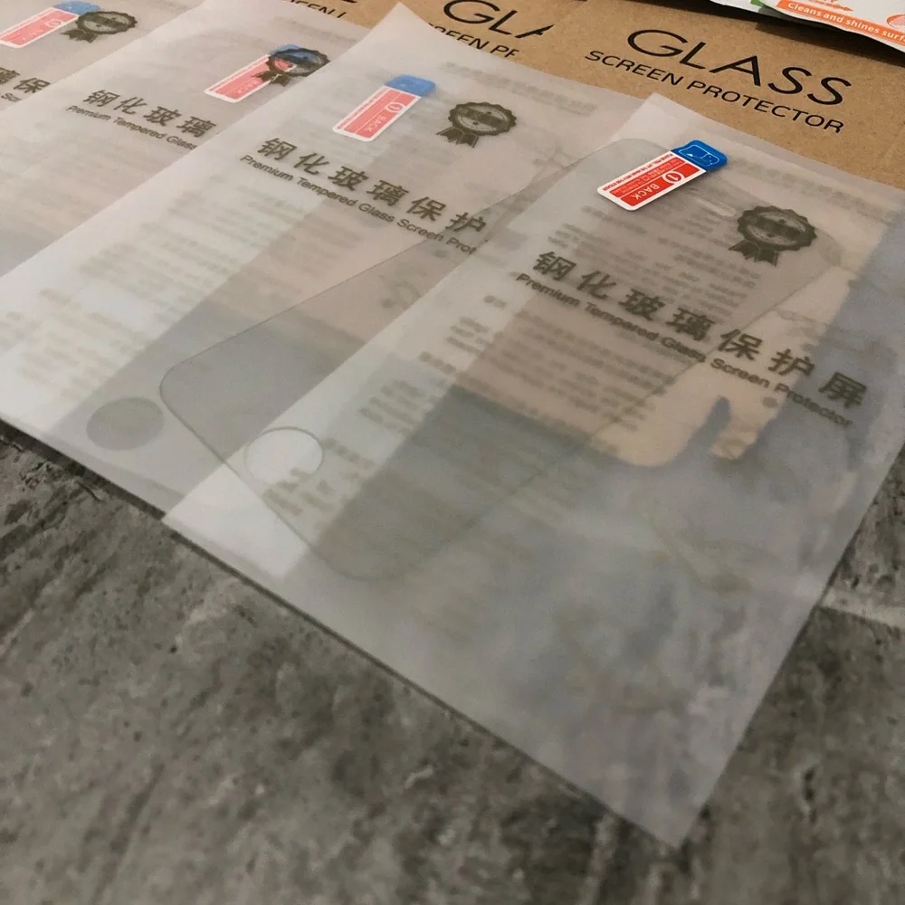 Six pack of iPhone 5s glass screen protectors with wipes to clean phone & screen